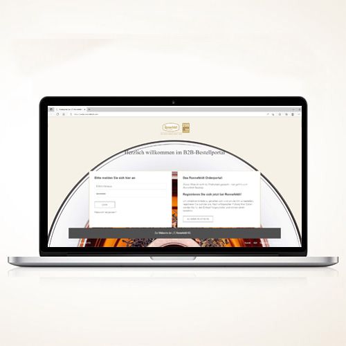Ein geöffneter Laptop zeigt die Anmeldeseite des Ronnefeldt B2B-Bestellportals.