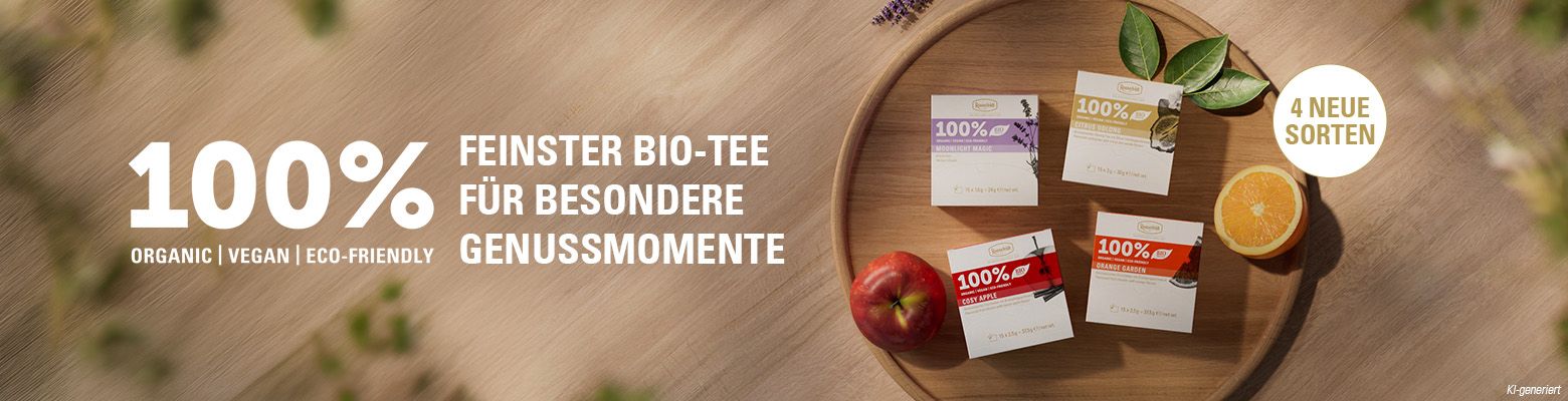 Banner mit vier neuen Teesorten auf Holztablett 