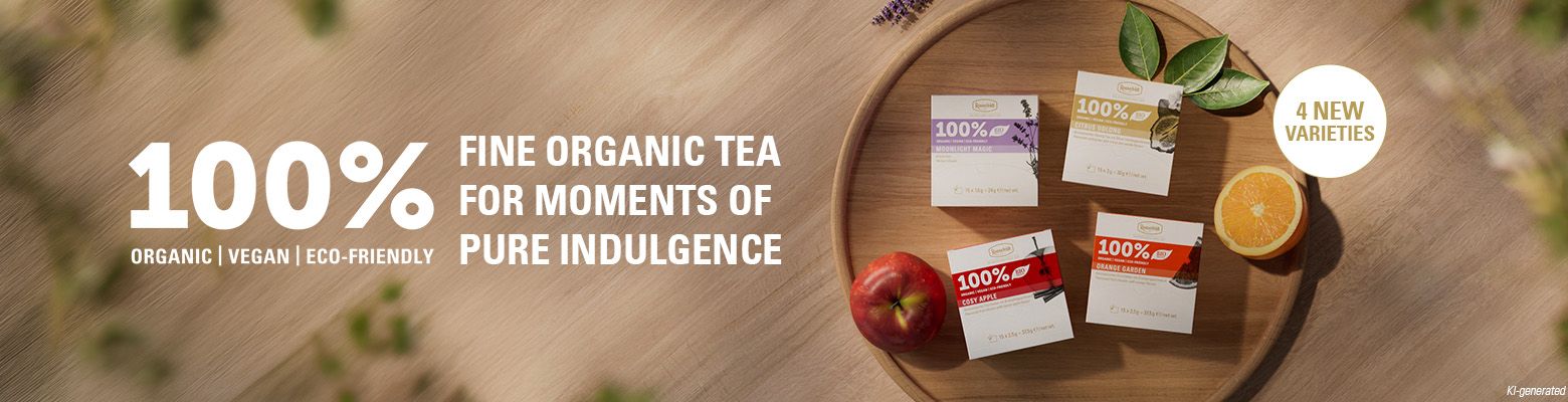 Banner featuring 4 new tea varieties on a wooden tray